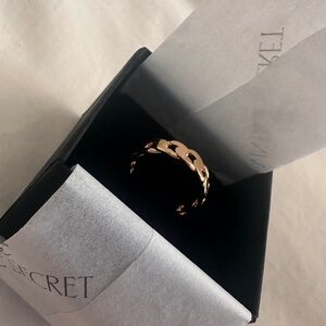 Brand new in box adjustable gold plated ring
